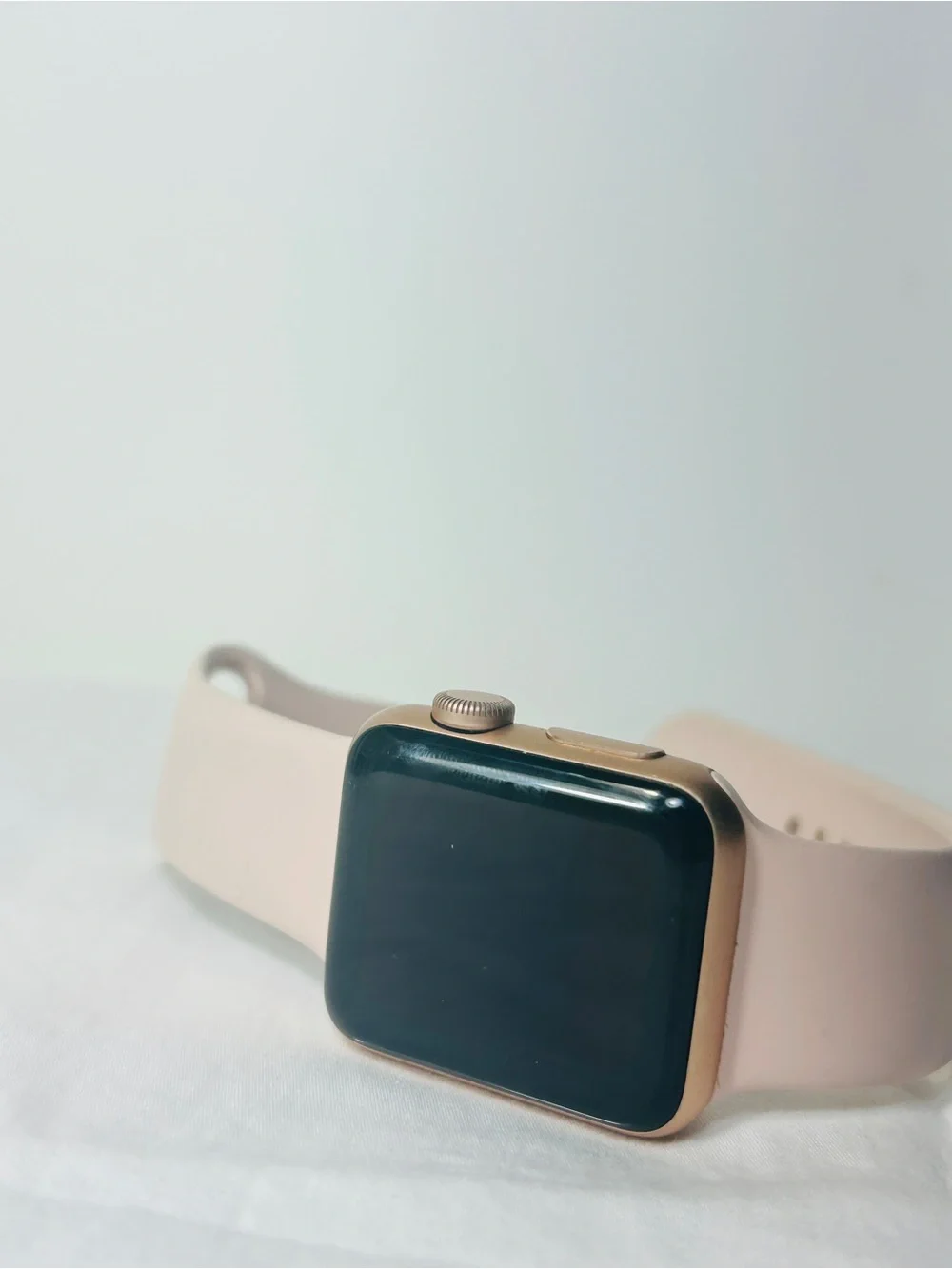 Apple Watch with Pale Pink Sport Band and Gold Case